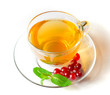 Glass Cup of Tea with Cranberries and Mint on the White
