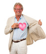 Healthy man holding love heart in front of chest