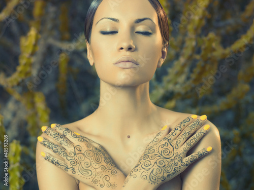 Photo: Lady with painted hands mehendi Lady with painted hands mehendi