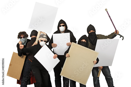 Photo: Protesters holding placards Protesters holding placards
