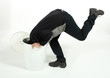 Man puts his head in the trash