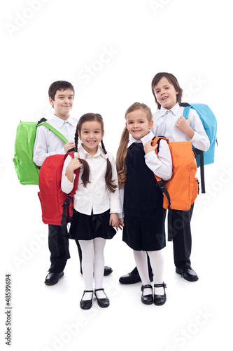 Photo: Happy school kids with colorful bags Happy school kids with colorful bags