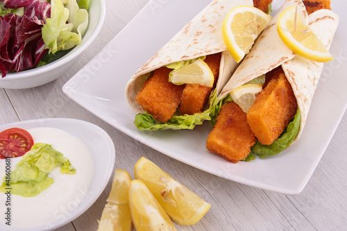 Photo: fajitas with fishsticks and salad fajitas with fishsticks and salad