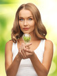 woman with energy saving bulb