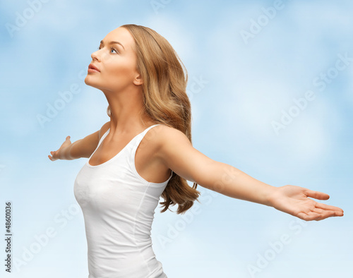 Photo: woman spreading hands woman spreading hands