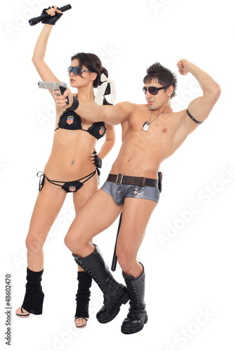 Photo: two dancers dressed as police two dancers dressed as police