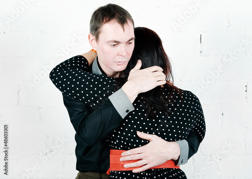 Photo: Man comforting his woman Man comforting his woman