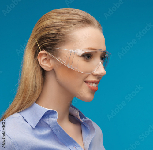 Photo: businesswoman in protective glasses businesswoman in protective glasses