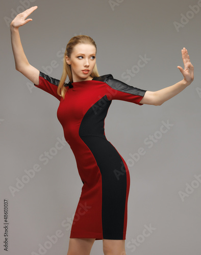 Photo: woman working with something imaginary woman working with something imaginary