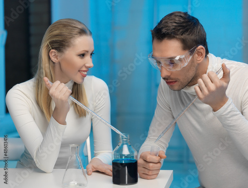 Photo: man and woman in laboratory man and woman in laboratory