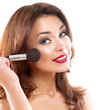 Beautiful Young Woman Applying Makeup. Brunette Girl