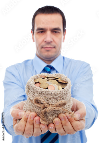 Photo: Businessman offering you a bag of money Businessman offering you a bag of money