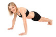 Foto: Beautiful fit young woman doing push ups Beautiful fit young woman doing push ups
