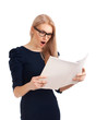 Shocked lady reading womens magazine