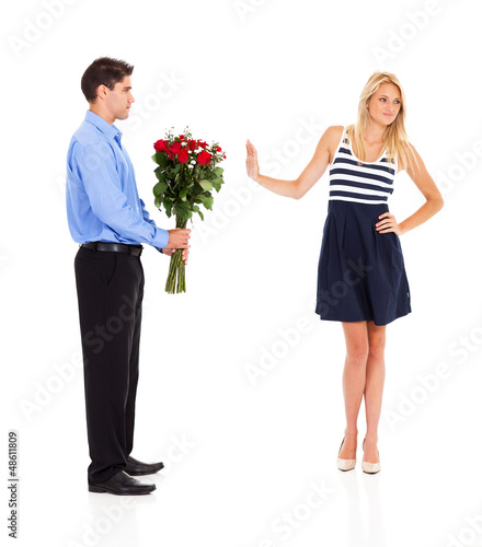 Photo: young man been rejected by a young woman on valentine's day young man been rejected by a young woman on valentine's day