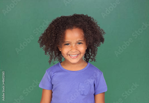 Photo: Adorable african little girl with beautiful hairstyle Adorable african little girl with beautiful hairstyle