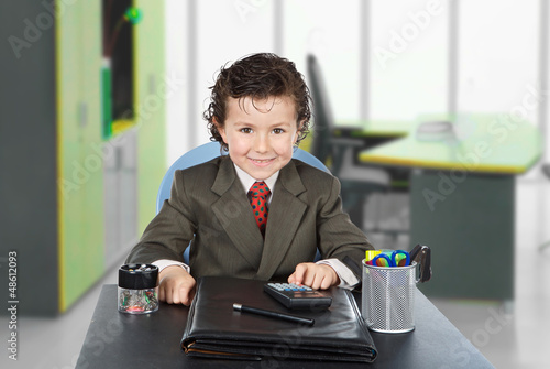 Photo: Adorable future businessman Adorable future businessman