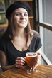 Young Woman Drinking Inda Pale Ale