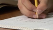 School Teen writing mathematic formulas