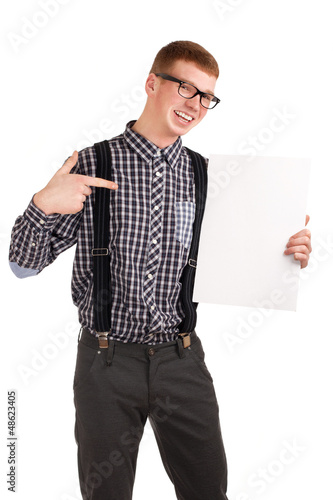 Photo: Portrait of a young man with blank board Portrait of a young man with blank board