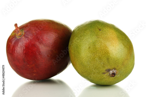 Photo: Ripe appetizing mango isolated on white Ripe appetizing mango isolated on white