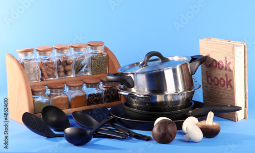 Photo: composition of kitchen tools,spices and cook book composition of kitchen tools,spices and cook book