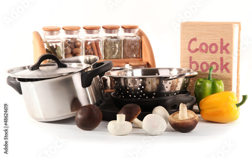 Photo: composition of kitchen tools,spices and vegetables isolated composition of kitchen tools,spices and vegetables isolated