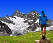 Photo: girl looking at the Mount Gabelhorn in the Swiss Alps girl looking at the Mount Gabelhorn in the Swiss Alps