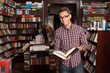 young attractive guy in a bookstore
