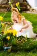 Girl on Easter egg hunt with eggs