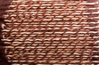 Stretched and twisted sinew detail on side of native drum