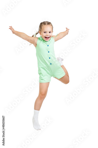 Photo: happy child girl jumping isolated on white happy child girl jumping isolated on white