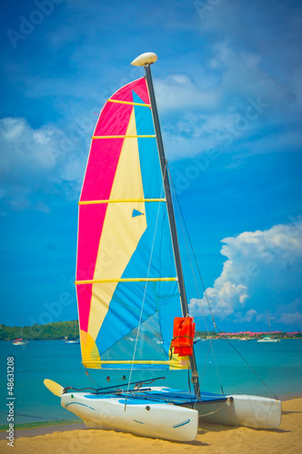 Photo: Sailboat at the ocean coast, Saint Lucia, Caribbean Islands Sailboat at the ocean coast, Saint Lucia, Caribbean Islands