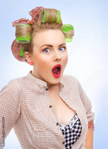Photo: Close-up portrait of a surprised / socked pin up girl isolated Close-up portrait of a surprised / socked pin up girl isolated