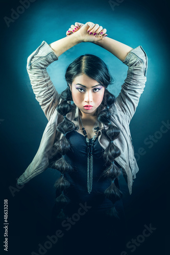 Photo: Beautiful brunette Asian woman with long black hair Beautiful brunette Asian woman with long black hair