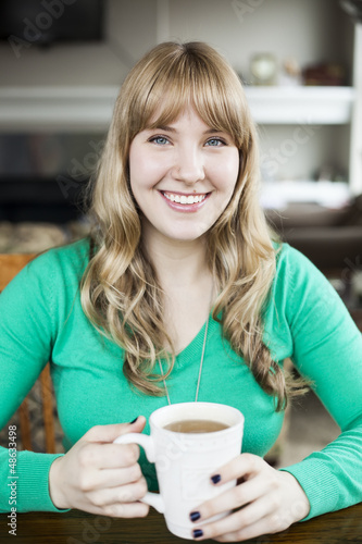 Photo: Young Woman Drinking Tea Young Woman Drinking Tea