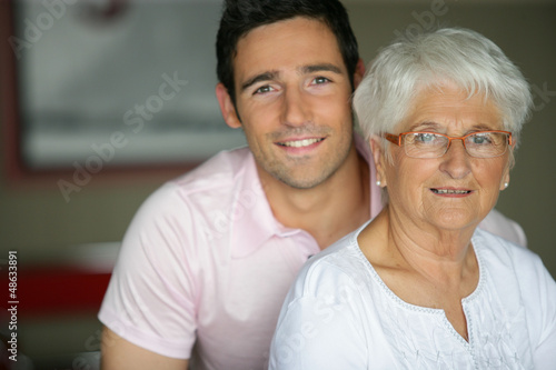 Photo: Grandson visiting grandmother Grandson visiting grandmother