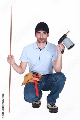 Photo: A kneeled welder. A kneeled welder.