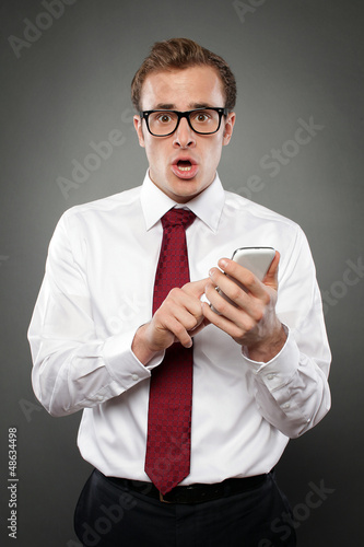 Photo: Man with Smartphone Man with Smartphone