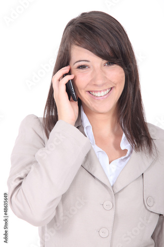 Photo: Young woman on phone Young woman on phone