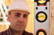 Builder with a spirit level