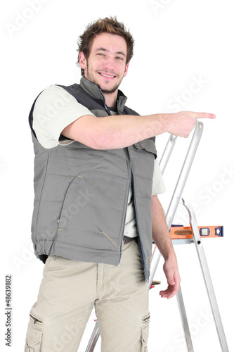 Photo: Tiler pointing to copyspace Tiler pointing to copyspace