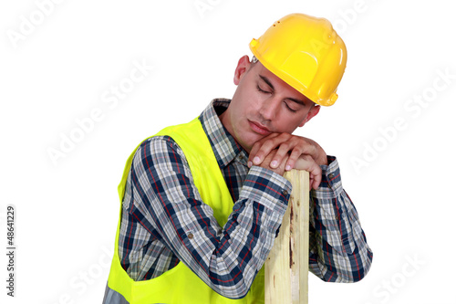 Photo: Construction worker sleeping Construction worker sleeping