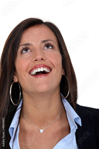 Photo: Businesswoman with look of amazement on face Businesswoman with look of amazement on face