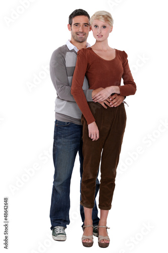 Photo: Full length portrait of a loving couple Full length portrait of a loving couple