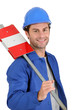 Builder with road sign