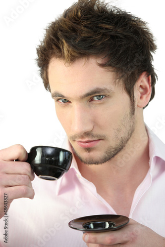 Photo: Man having a cup of coffee Man having a cup of coffee
