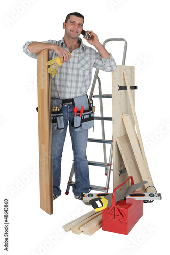 Photo: Handyman talking to a supplier Handyman talking to a supplier