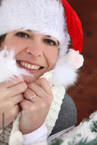 Photo: Woman in a Santa hat Woman in a Santa hat