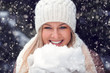 Photo: happy woman holding snow happy woman holding snow